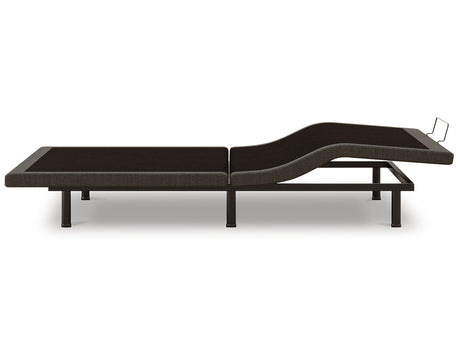 Side view showing foot elevated on adjustable base