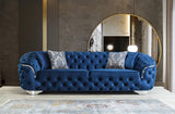 Scarlett blue velvet sofa and loveseat set in living room view