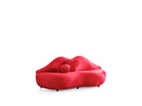 Close-up of red velvet upholstery on Audrey Loveseat