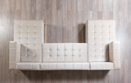 Detail view highlighting velvet fabric texture on sectional sofa