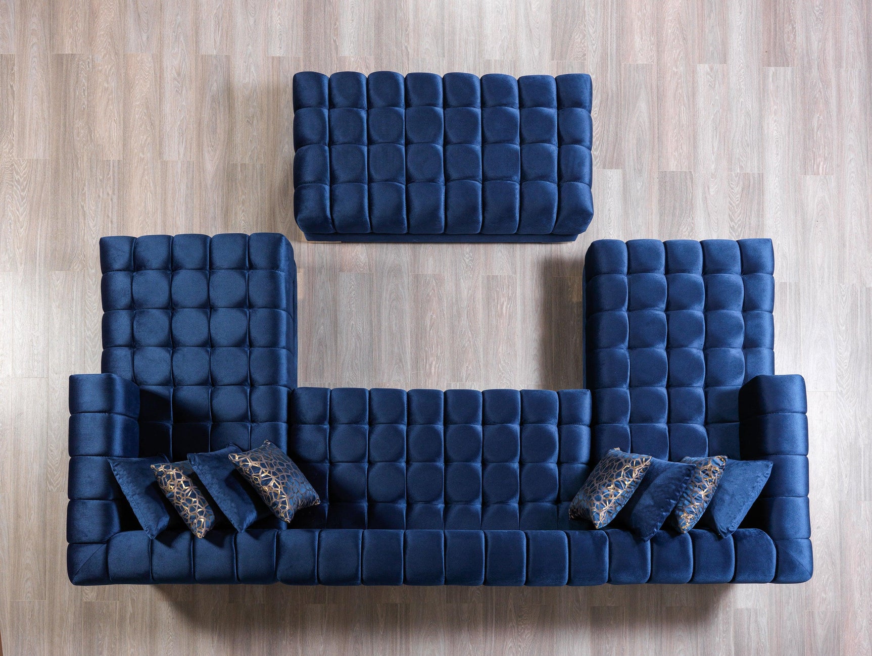 side profile of blue velvet Mia sectional