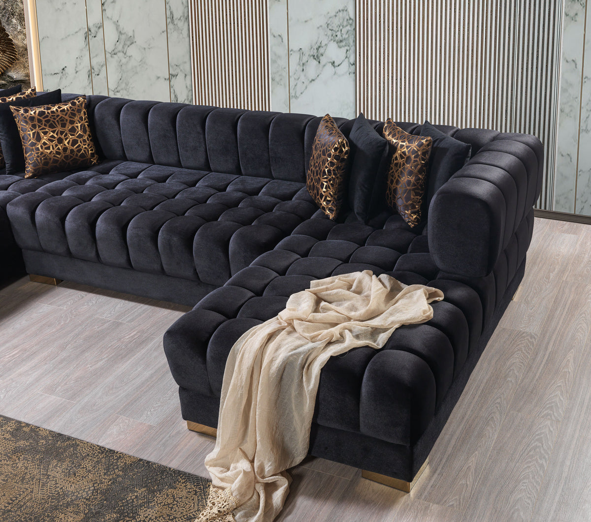 Living room view with Mia black velvet sectional sofa