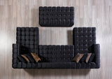 Side perspective of Mia black velvet sectional sofa
