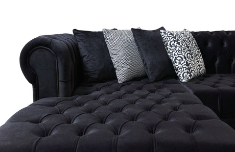 Room setting featuring the Emma Black Velvet sectional sofa