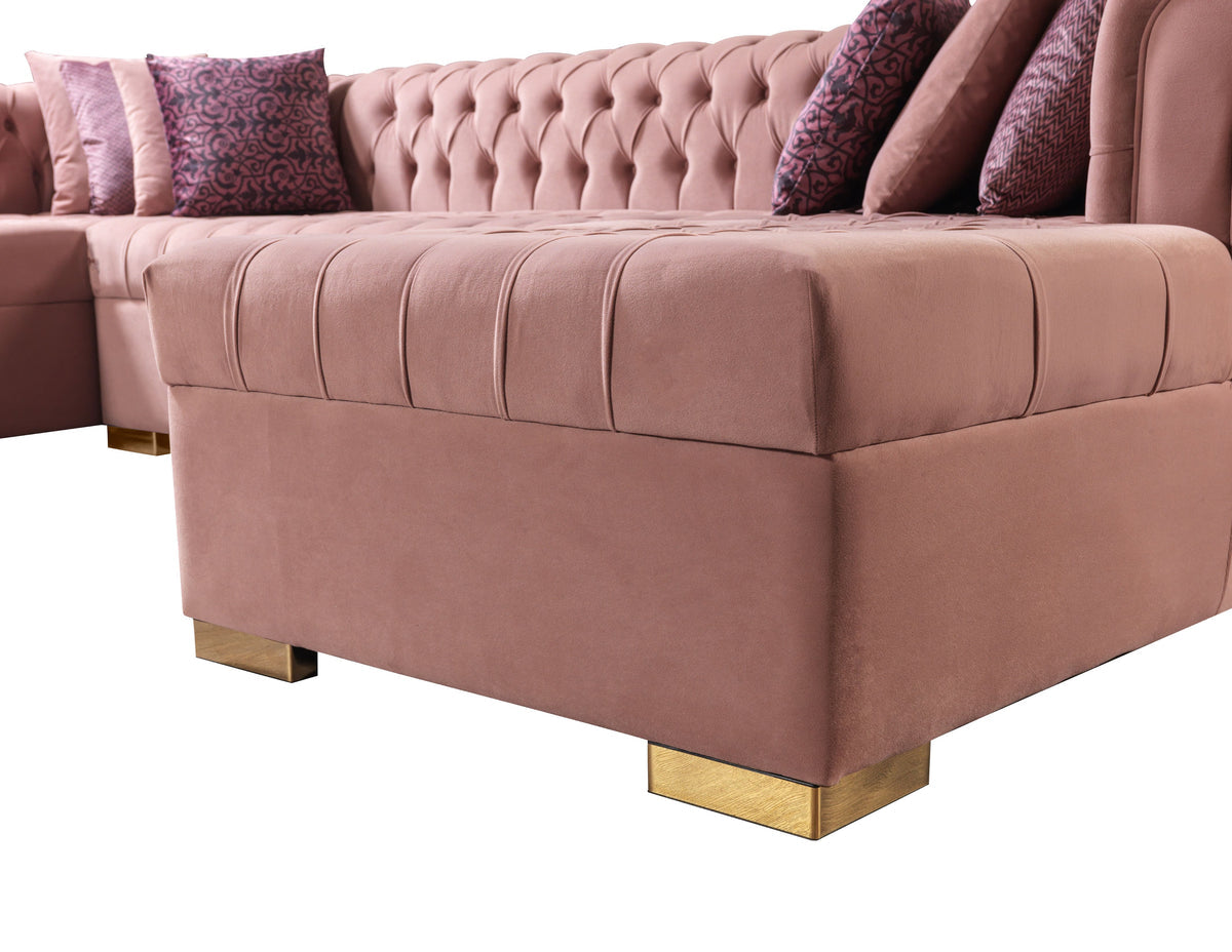 Detail of chaise section on pink velvet sofa