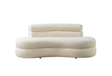 Ivory boucle loveseat in modern living room setting