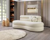 Close-up of ivory boucle fabric texture on loveseat