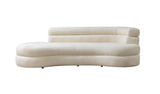 Front view of chaise lounge showing ivory boucle fabric