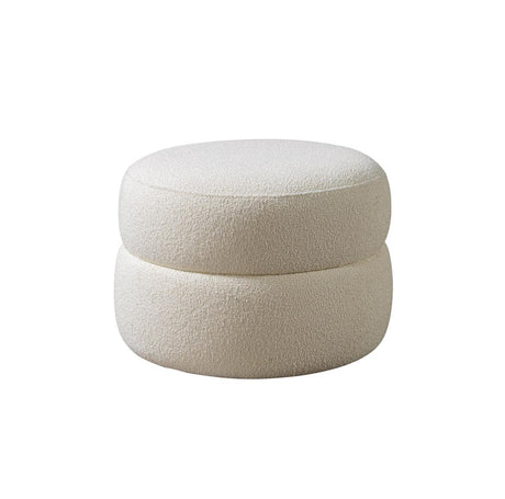 Front angle of Sandy Ivory Boucle Round Ottoman showing ivory boucle texture