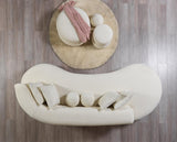 Side profile of Sandy Ivory bouclé chaise lounge