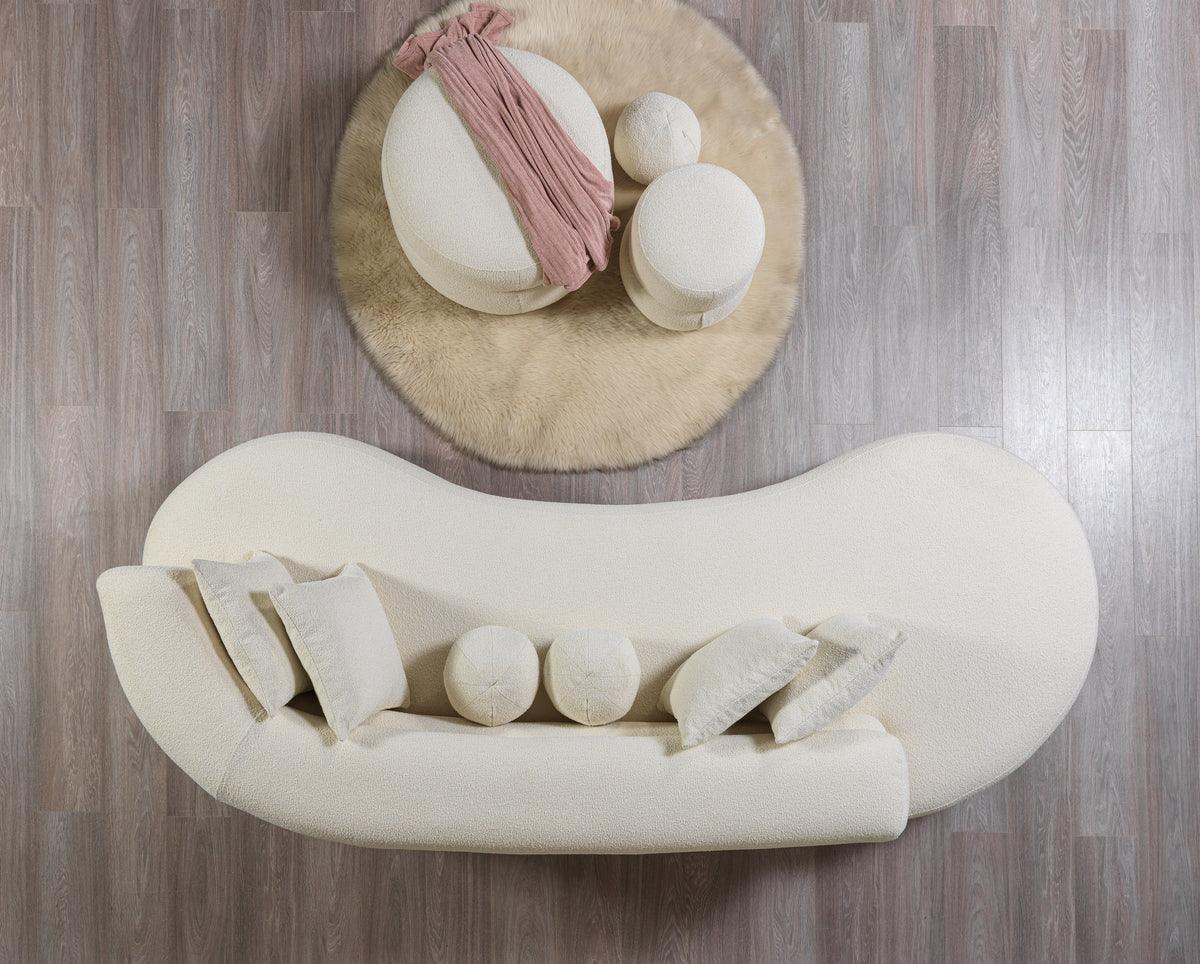 Side profile of Sandy Ivory bouclé chaise lounge