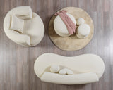 Angled view of Larissa loveseat on showroom floor