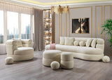 Ivory boucle chaise lounge elegant side view