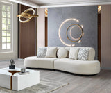 Room setting with Olivia Ivory Boucle Curved Sectional Sofa