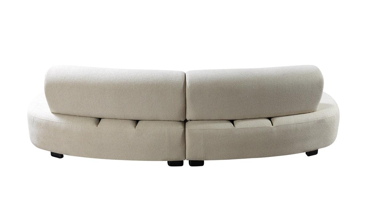 Detail of curved sectional arm and tufting