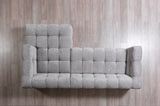 upclose texture of bouclé fabric on sectional sofa arm