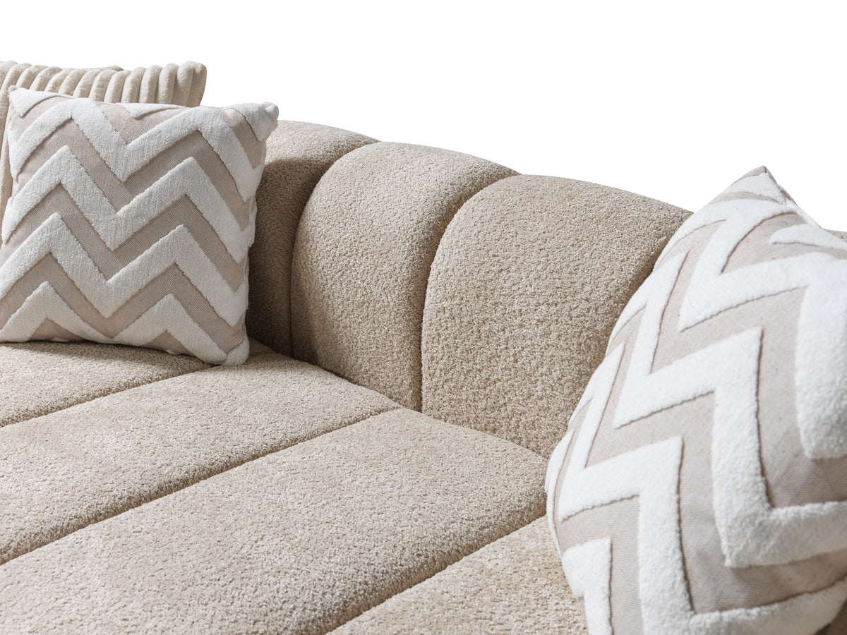 Front angle of Elly Sand boucle sectional sofa