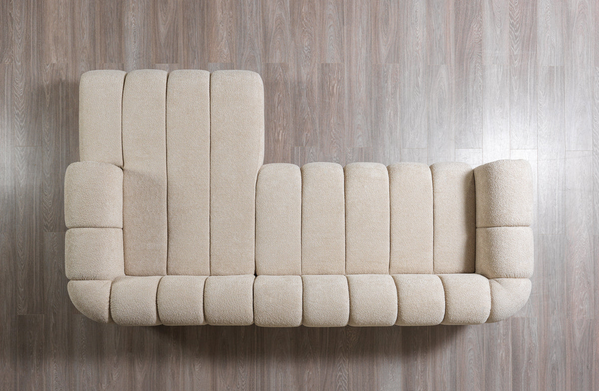 Close-up of sectional sofa arm and fabric texture