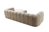 Close-up detail of cushions on Elly Sand sectional
