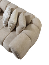 Elly Sand Boucle sectional sofa side perspective