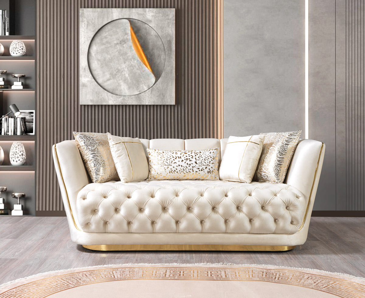 close-up detail of sofa arm on ivory velvet furniture