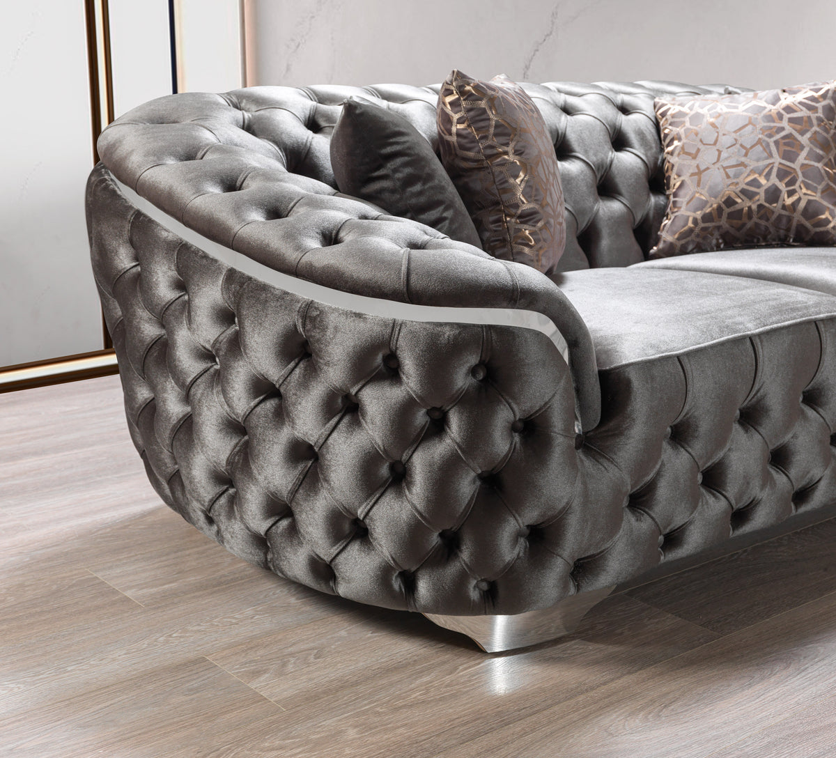 angled side view of gray velvet sofa and loveseat