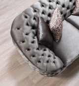 close detail of sofa arm and velvet texture
