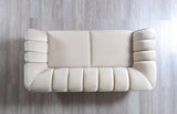 Decorative nailhead trim detail on loveseat
