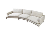 Side angle highlighting ottoman and sectional configuration