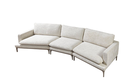 Side angle highlighting ottoman and sectional configuration