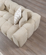 Lili Sand Boucle sectional sofa angled side view