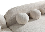 room perspective showing Hanna Sand Bouclé sectional sofa