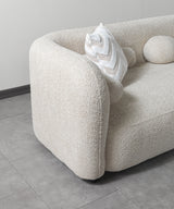 side view of Hanna Sand Boucle RAF 110" Sectional sectional sofa