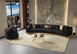 Close-up detail of black velvet upholstery on sectional sofa