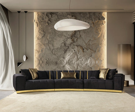 Living room setting with Anne Black Velvet Curved Sectional Sofa