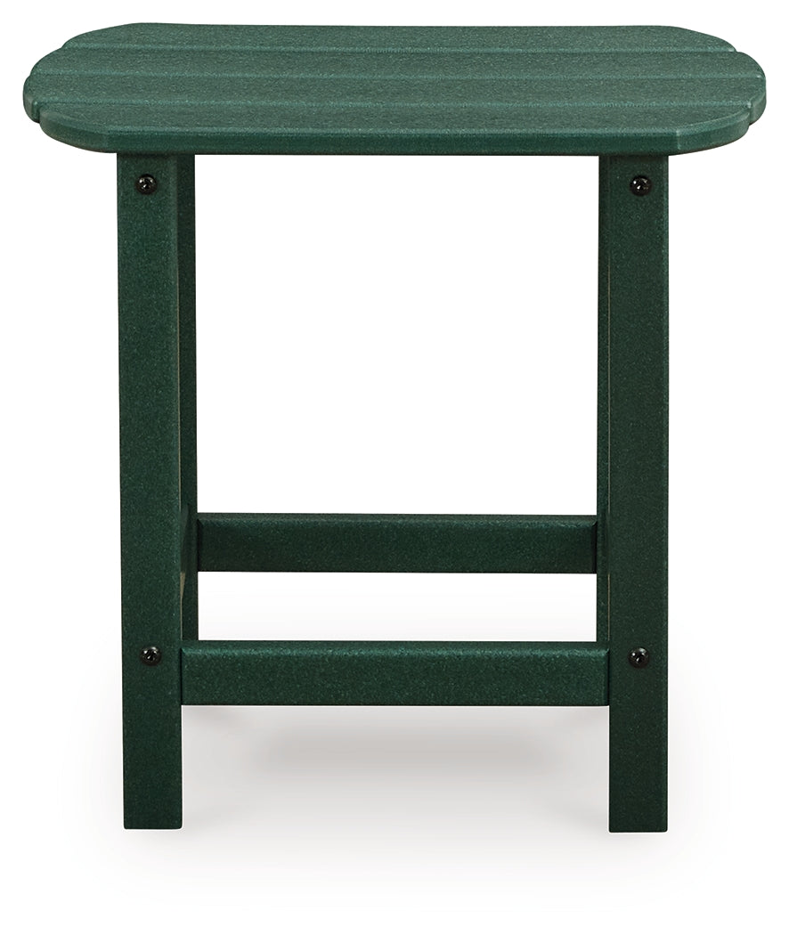 Green Adirondack chair showing slatted design