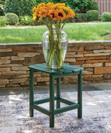 Close-up of green Adirondack chair seat and armrest