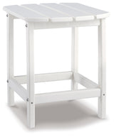 White end table from Sundown Treasure set, outdoor setting