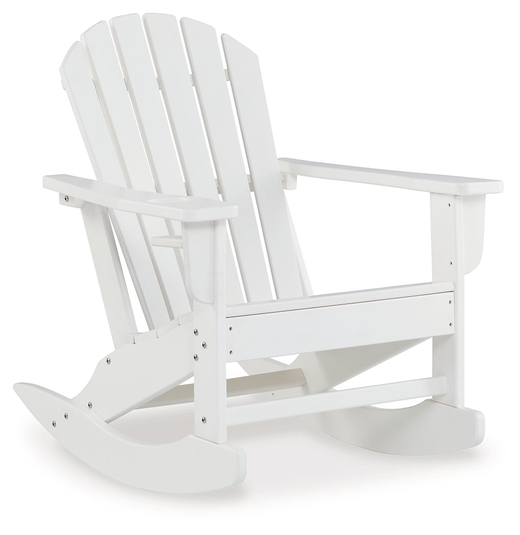 Side view of white rocking chair showing slatted rain-shedding design