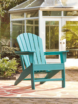 Turquoise chair on patio setting
