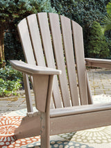 Sundown Treasure Driftwood Adirondack Chair with slatted back and wide armrests