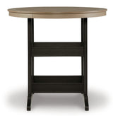 Close-up of black frame and driftwood finish details on the table