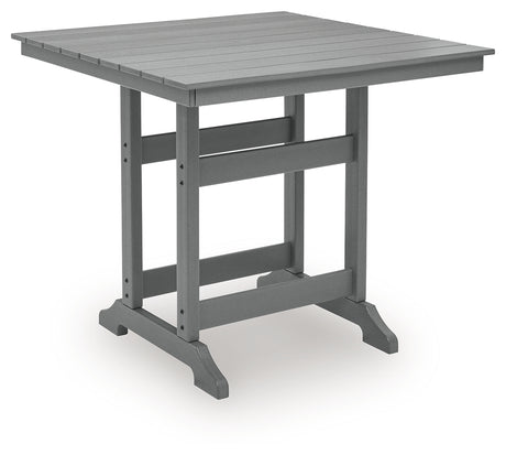 Angle view of outdoor dining table showcasing slatted design