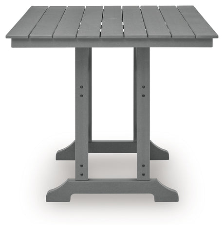 Set of four dark gray barstools arranged around counter height table