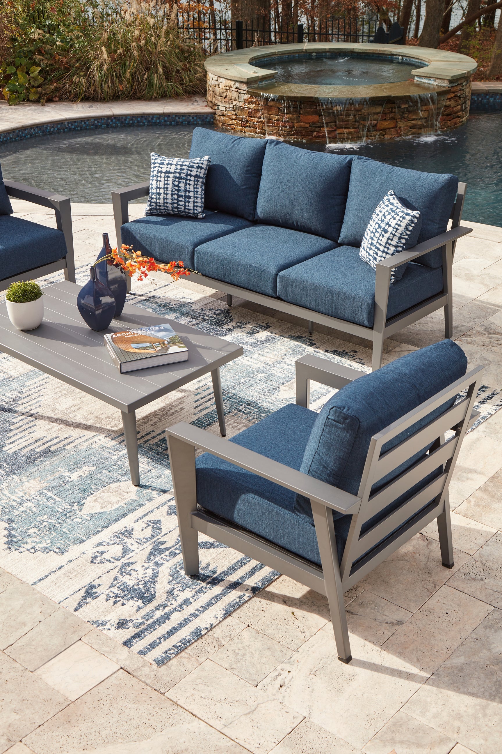 Gali outdoor gray and blue patio furniture set with sofa, chairs, and table