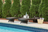 Pair of Kantana Brown Outdoor Chaise Lounges reclining position