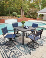 Outdoor dining table set styled in outdoor patio