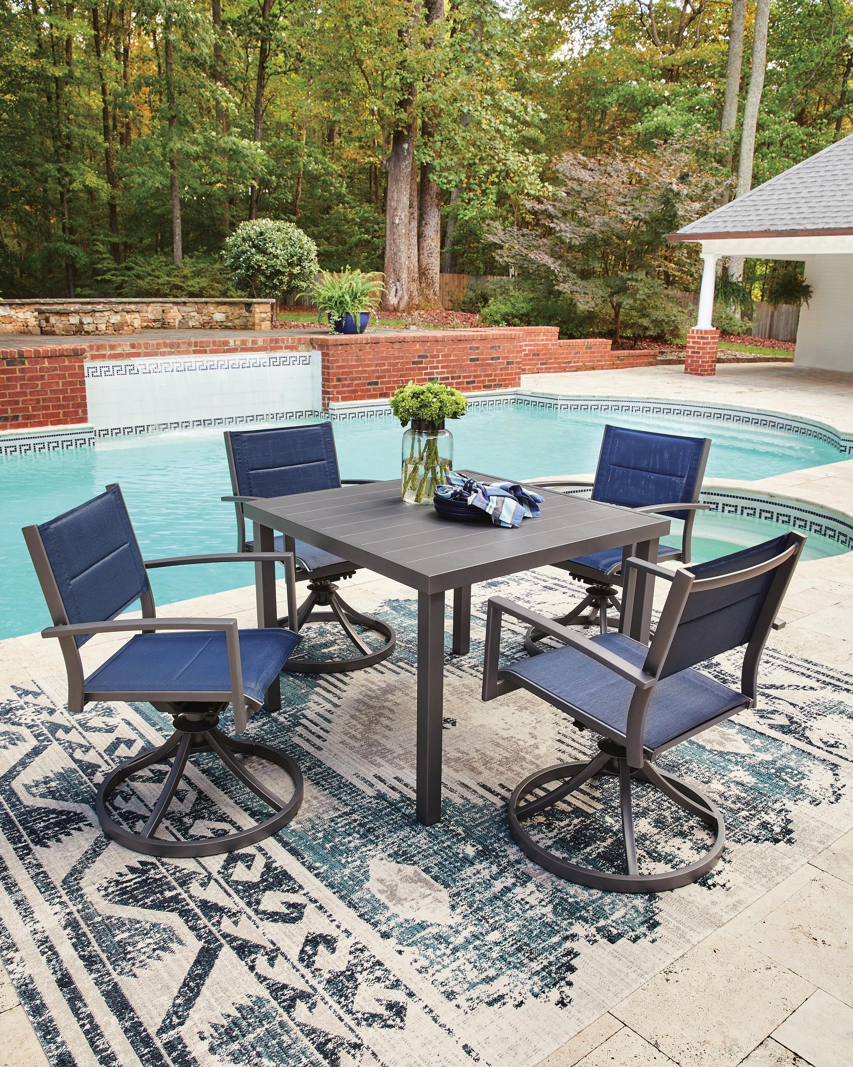 Outdoor dining table set styled in outdoor patio