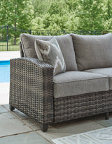 Oasis Court chair close-up of armrest and cushion