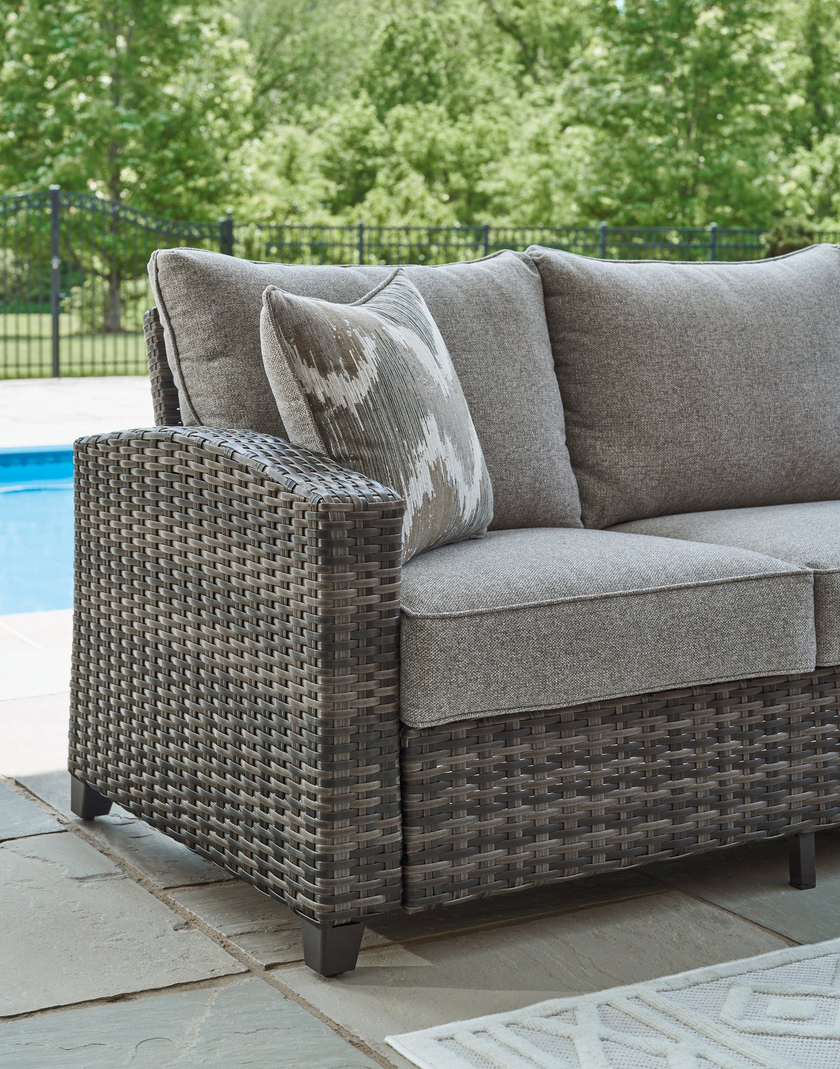 Oasis Court chair close-up of armrest and cushion